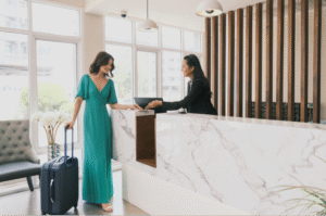A picture of a lady in a Hotel for the media analytics report made by Media monitoring company, Media Meter.
