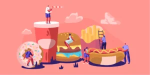 The image is a whimsical and colorful illustration featuring oversized fast-food items, including a large soft drink, a donut with sprinkles, a hamburger, french fries, and a hot dog. Several small human figures interact with these giant food items: one person stands on top of the soft drink holding a straw, another walks through the hole of the donut, two people are climbing on the hamburger, another person is climbing a ladder leaning on the french fries, and two people are engaging with the hot dog. The background is a soft pink color with light clouds, giving the scene a playful and surreal atmosphere, likely representing themes related to fast food culture, indulgence, or a creative take on the fast food industry.