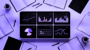 Modern business analytics dashboard displaying comprehensive data visualizations on a tablet screen, surrounded by notebooks and pens on a purple workspace - essential tools for developing strategies to get featured in leading publications through data-driven storytelling and compelling visual presentations.RetryClaude can make mistakes. Please double-check responses.